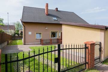 Фото номера Дом с 5 спальнями Дома для отпуска Holiday House Bursztyn by Renters г. Колчево 11