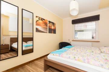 Фото номера Дом с 5 спальнями Дома для отпуска Holiday House Bursztyn by Renters г. Колчево 21